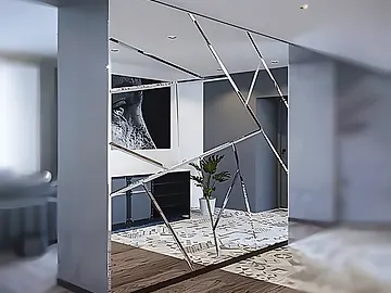 irregular geometric mirror tiles fitted as a feature wall