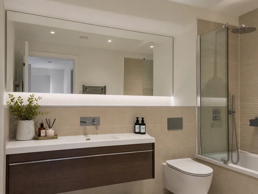 Bathroom mirrors fitted in a modern apartment development